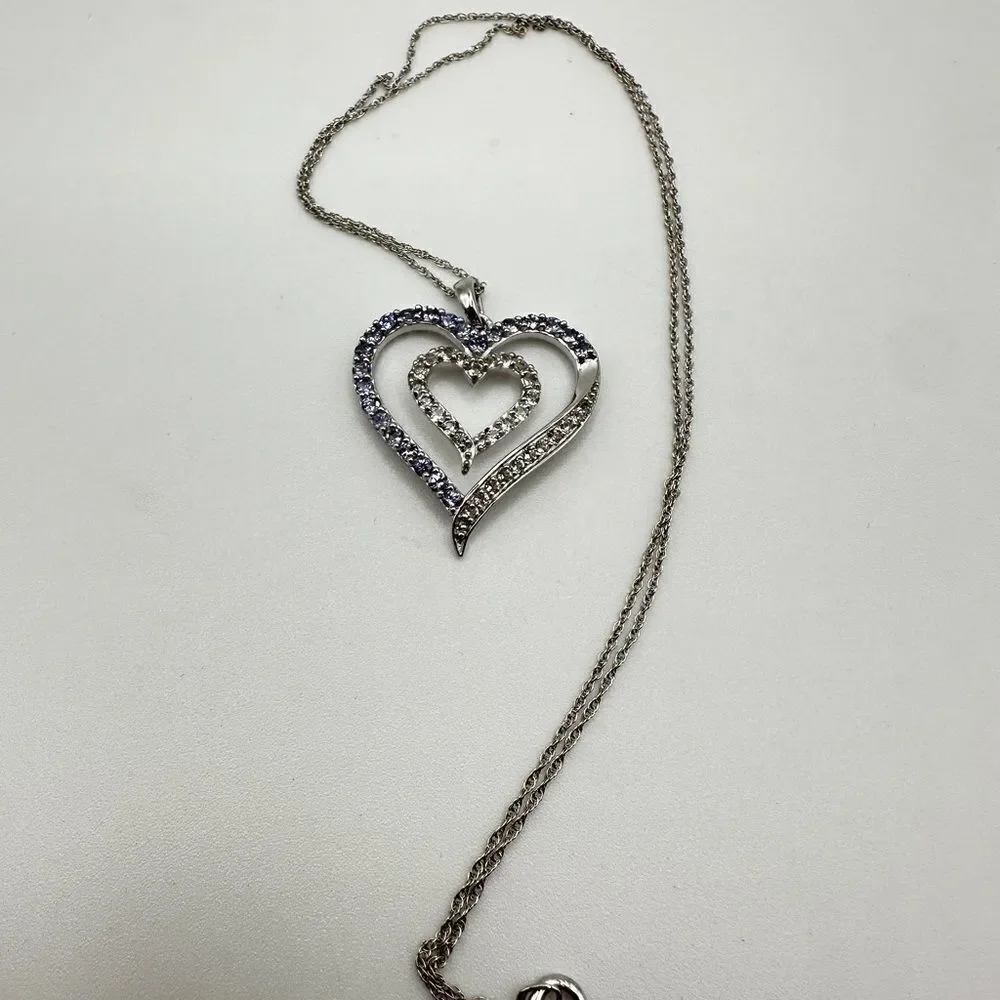 Genuine 1.5ctw tanzanite and‎ CZ accent heart necklace in sterling silver!
